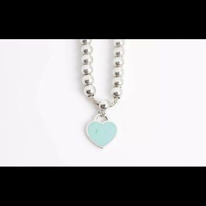 Tiffany’s bracelet. I had it polished atTiffany& Co. Jewelry store. Never wore.